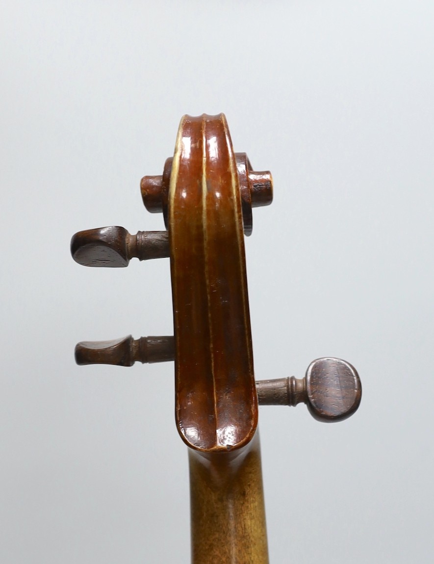 A cased three quarter size violin, labelled E.Coiffier, 56cms long